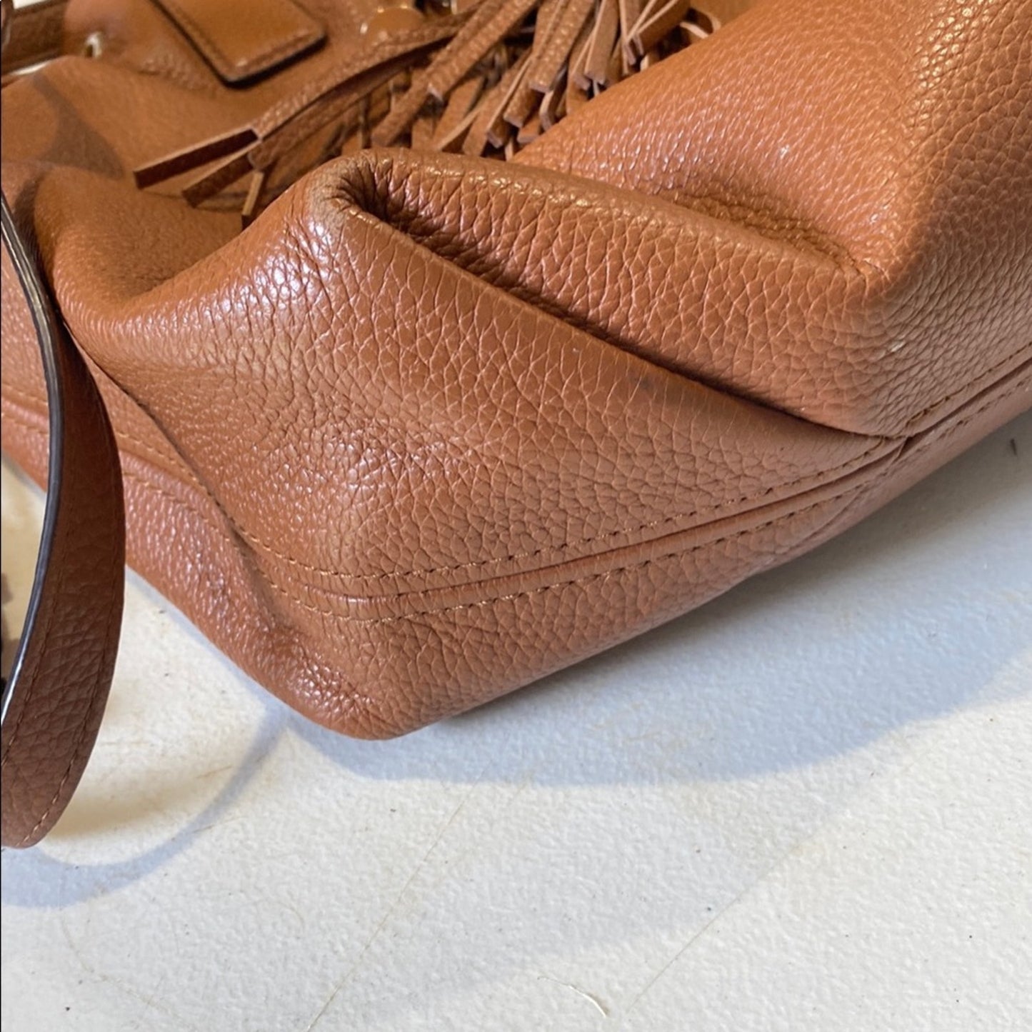 Michael Kors Brown Shoulder Bag with Tassel and Drawstring Accents