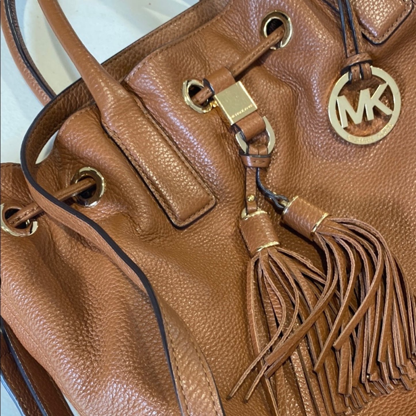 Michael Kors Brown Shoulder Bag with Tassel and Drawstring Accents