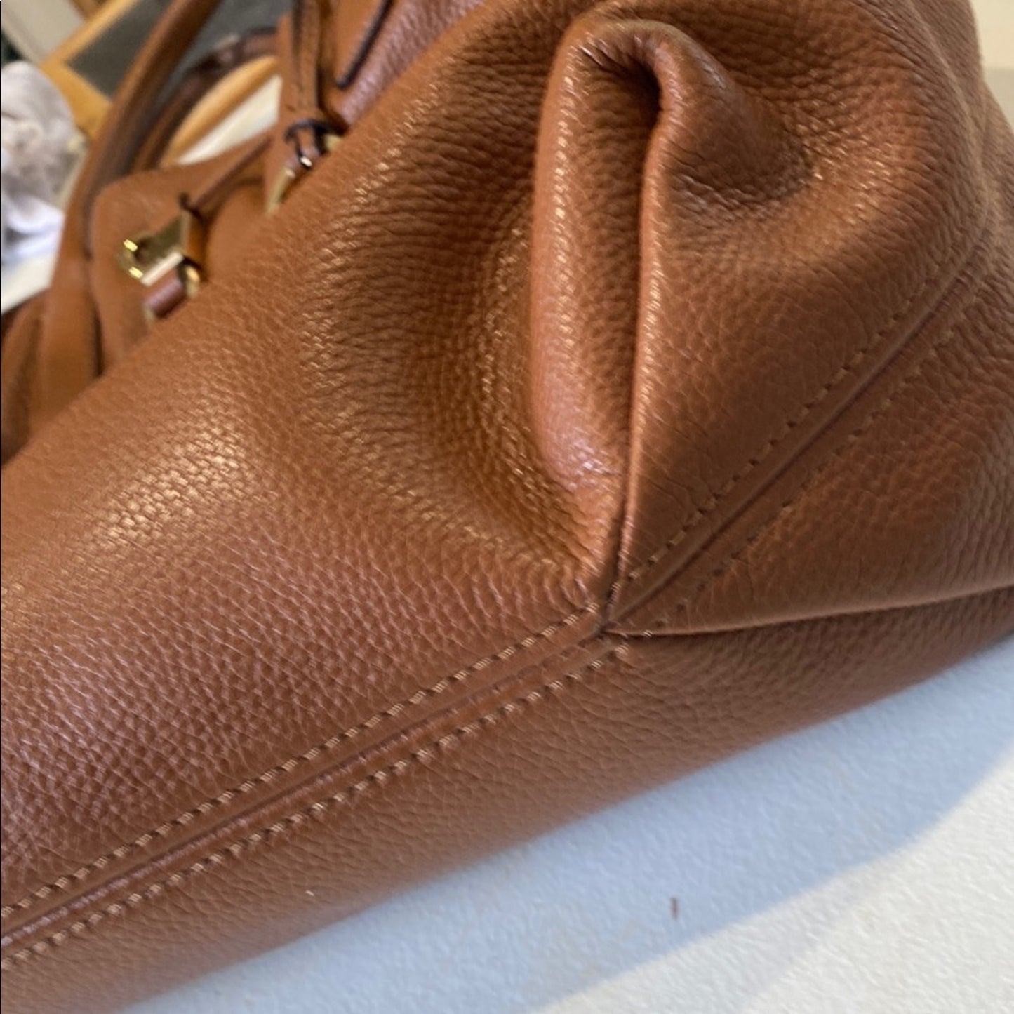 Michael Kors Brown Shoulder Bag with Tassel and Drawstring Accents