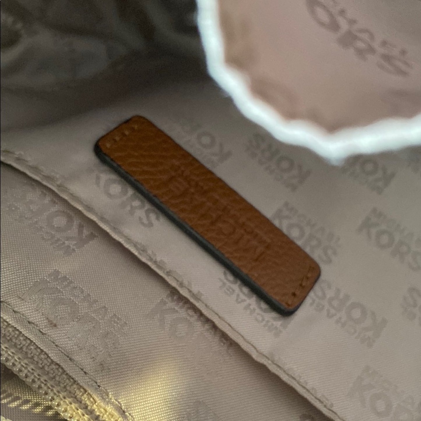 Michael Kors Brown Shoulder Bag with Tassel and Drawstring Accents