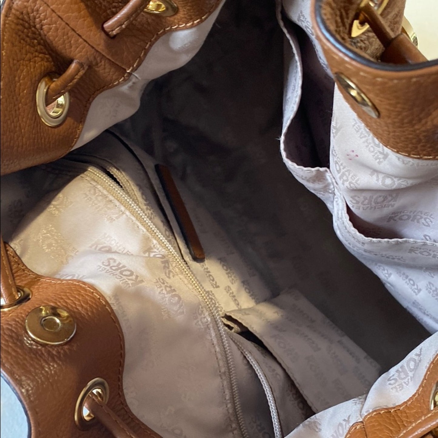 Michael Kors Brown Shoulder Bag with Tassel and Drawstring Accents